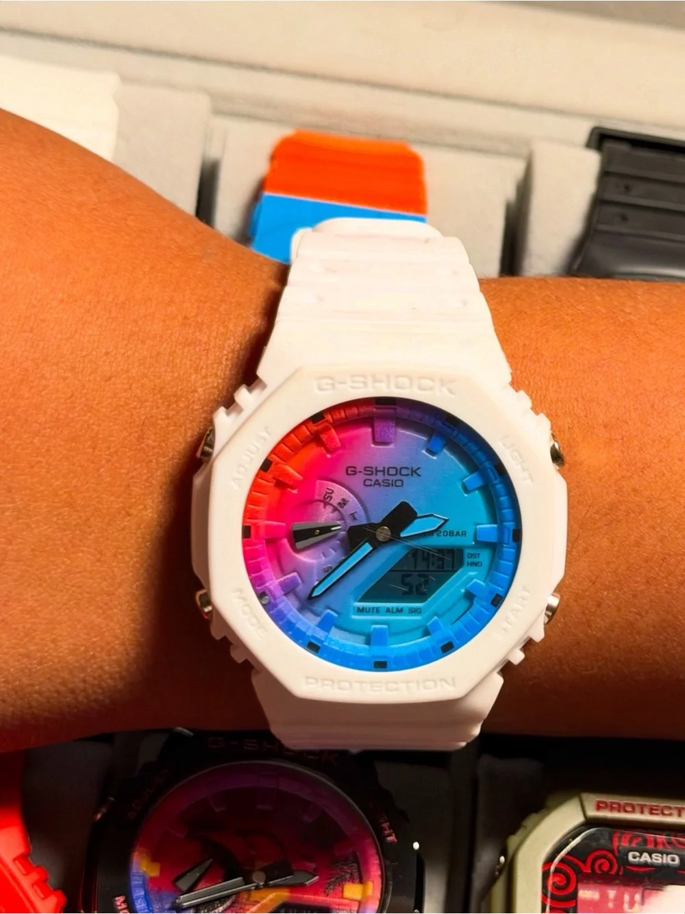 G-Shock White Watch with Pink and Blue Gradient Dial